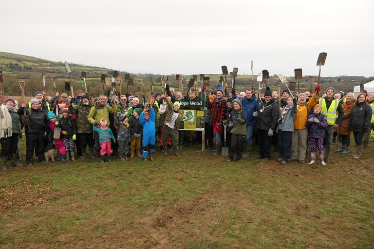 People celebrating at the South Brent woodland planting.