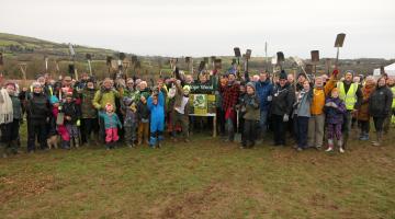 People celebrating at the South Brent woodland planting.